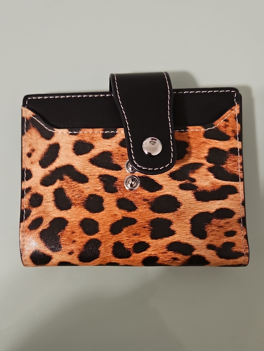 Leopard Print Trifold Wallet with Black Snap Closure